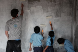 Working on the walls together