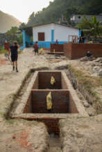 The septic with new toilets and classrooms behind