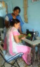 A lady undergoing basic tailoring training