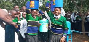 Students happily enjoying water access
