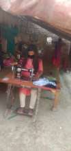 Girl Icon Jyoti stitching masks for her community