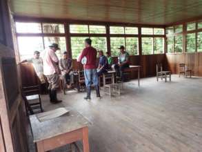 Daniel with community elders in Nueva Saposoa