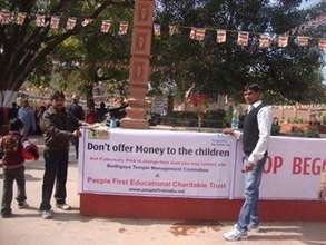 Our staff at work outside ain temple in Bodhgaya