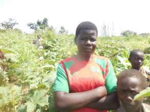 Natalie, a student helping grandmother to harvest