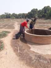 Water manually pumped and carried to field