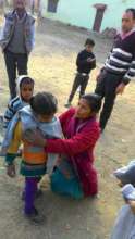 Munni wears her thermal shirt