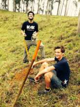 Gui and Tom preparing the land for the seedlings