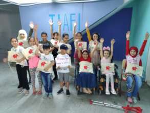 Children receiving the education kits