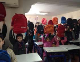 Syrian Refugee Children with Their New SchoolBags
