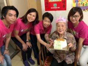 Celebrating Yee Gu's 100th birthday at her flat
