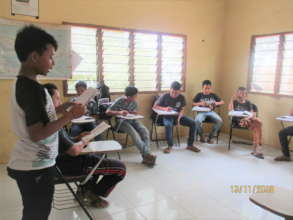 One of our EBPP children in front of class