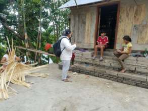 Our teacher visiting the students at their home