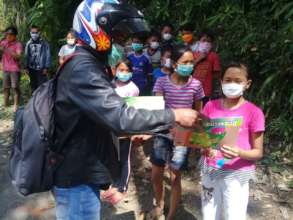 Students receive drawing materials