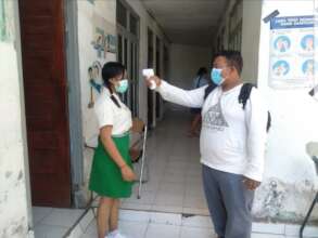 Checking student's temperature