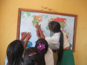 Students enjoying their new world map