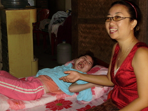 Andee with SEDA founder, Souly, enjoys her brand new day bed