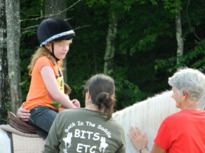 Kathy adjusting the stirrup