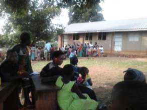 Patients waiting, lining up for treatment