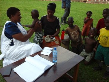 Examining a child.