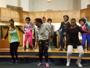 Dancing at an interfaith vigil.