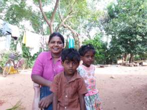 Vijayalakshmi with her two kids at their home