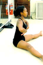 Young Christina teaching a dance lesson