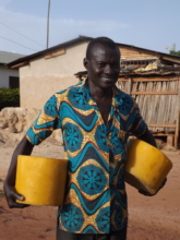 Osuwu with his recent harvest of beeswax