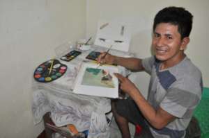 Guillermo painting in his room in Iquitos