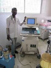 Dr. Adlin and the newly arrived ultrasound machine