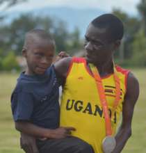 David and Ayebale with his Olympic silver medal