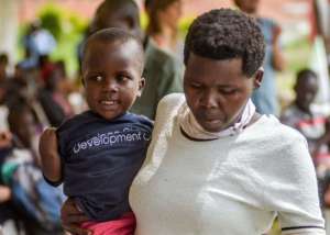 Edward and his mother at KCDC's community fun day