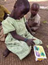 Tabisha developing her fine motor skills