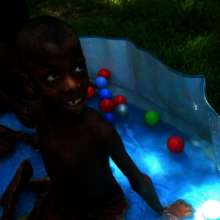 James in the paddling pool