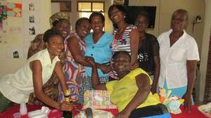 Mdm Woo Woo and the staff during her leaving party