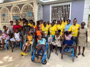 Staff and children at new respite center in Haiti