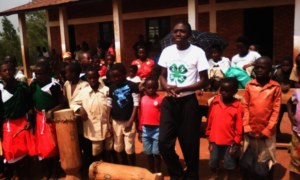 Burundi 4-H educator working with students