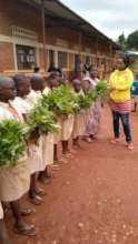 Students showcasing their harvest
