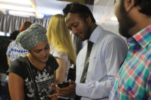 Rahat shows the app to an EFAR First Responder