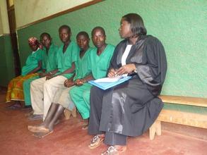 Volunteer lawyer Diane preparing the defense of a client