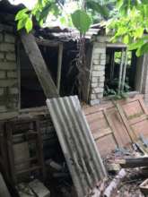 Volodymyr and Tetiana destroyed house