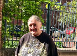 Deborah enjoys a warm day in the courtyard