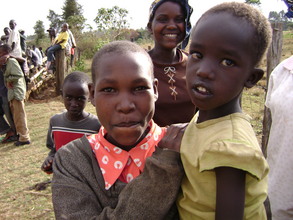 Anne holding her younger sister after their brief re-union