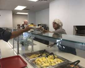 Volunteer serving dinner last week