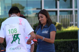 Educator talking with one of our youths