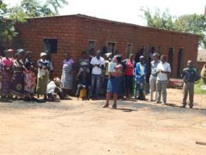 FCI Staff training farmers in Zomba