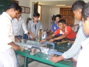 Nang, center, in shop class