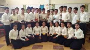 Phanny, (3rd from left, standing), with his class