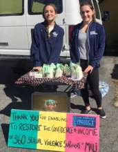 Rachael and friend sell the soap in Washington