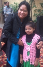 Tuba and Dr. Mishra pose for picture