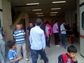 Refugees anticipating for our food distributions